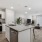 Large kitchen island inside townhomes at The Harper Trout River