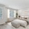 Large windows inside The Harper Trout River's townhome bedrooms