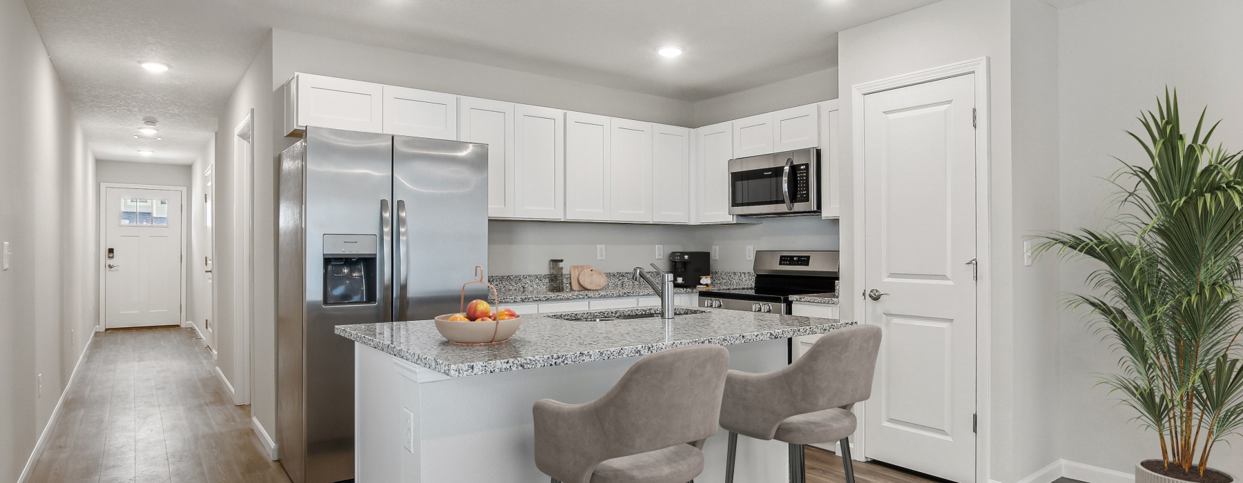 Modern kitchen finsihes inside townhomes at The Harper Trout River