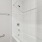 Modern white tiling in the townhome bathrooms at The Harper Trout River
