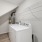 Washer and dryer next to the townhome's water heater at The Harper Trout River